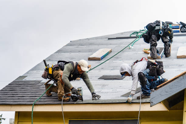 Professional Gutter Installation technician working in Spokane, WA